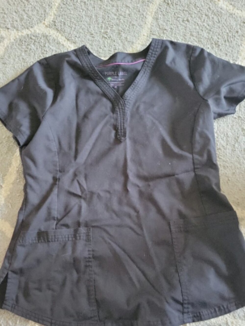 Womens size medium black Scrub Top. Purple label by healing hands